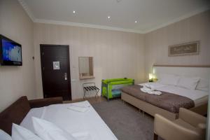 Letto o letti in una camera di Rustaveli Palace