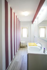 Kúpeľňa v ubytovaní Archimede Lounge