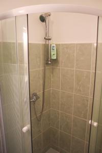 Kúpeľňa v ubytovaní Little Hungary Apartment + 37 fotografií