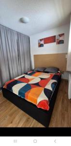 Cama o camas de una habitación en Bienvenue chez livia