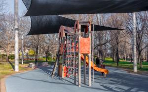 a playground with an orange slide in a park at Cosy 2BR in Reid with free wifi n parking in Canberra