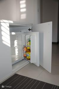 A kitchen or kitchenette at Rescio's Rooms