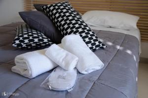 A bed or beds in a room at Rescio's Rooms