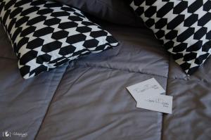 A bed or beds in a room at Rescio's Rooms