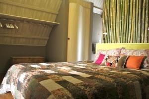 Een bed of bedden in een kamer bij La Jauchelle