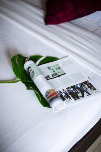 Postel nebo postele na pokoji v ubytování Ariya inn Chiangrai