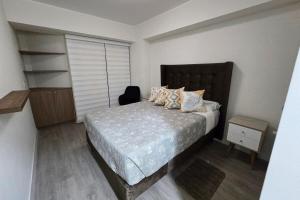 Postel nebo postele na pokoji v ubytování Modern Apartment in Barranco near the Malecón + 9 fotografií