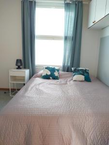 Postel nebo postele na pokoji v ubytování Holidayhome Tahkon Koivulan Kivi