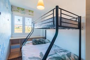 Katil atau katil-katil dalam bilik di Apartamento San Juan Cuchía