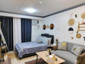 Ένα ή περισσότερα κρεβάτια σε δωμάτιο στο Budget Staycation By Melanie