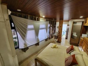 Imagen de la galería de Cozy Home - Mountain view in roof deck, en Baguio