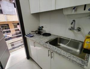 Η κουζίνα ή μικρή κουζίνα στο Living lodge hotel