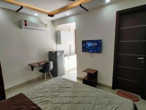 Μια τηλεόραση ή/και κέντρο ψυχαγωγίας στο Living lodge hotel