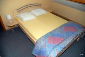 Letto o letti in una camera di La Clé des Champs