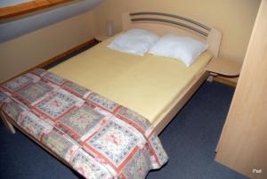 Letto o letti in una camera di La Clé des Champs