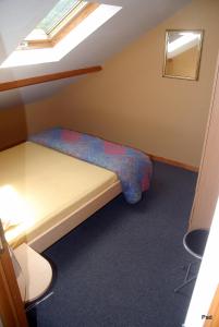 Letto o letti in una camera di La Clé des Champs