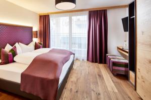 Posteľ alebo postele v izbe v ubytovaní Gletscherblick B&B