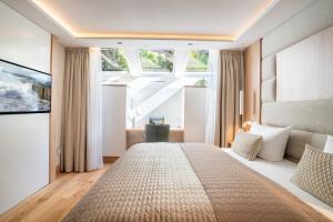 En eller flere senge i et værelse på Strandhaus