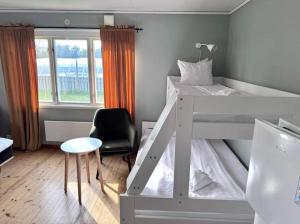 Postel nebo postele na pokoji v ubytování Tofta Stugan