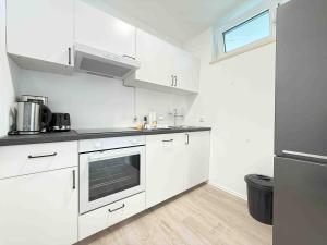 Η κουζίνα ή μικρή κουζίνα στο SAD165 Möblierte Monteurwohnung mit Balkon