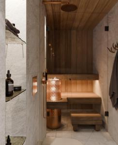 a bathroom with a shower with a toilet in it at North Suite Nova by Hilla Villas in Kittilä
