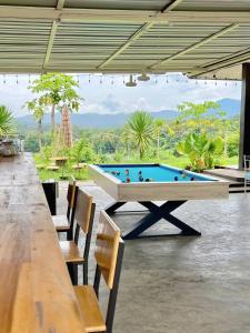a pool table in the middle of a room at 17Stories 1 in Pai