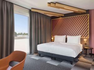 Postel nebo postele na pokoji v ubytování B&B HOTEL Emmerich