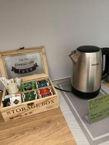 a tea pot and a box of chocolates at RavennaMia in Ravenna
