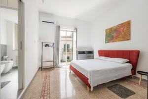 Ένα ή περισσότερα κρεβάτια σε δωμάτιο στο Almaré Apartment Mondello