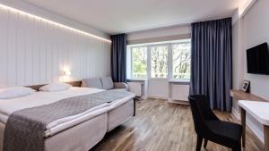 Krevet ili kreveti u jedinici u okviru objekta Rannahotell