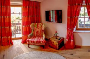 Televízia a/alebo spoločenská miestnosť v ubytovaní Serviced Apartments VILLA LICHT