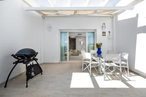 Χώρος καθιστικού στο Casa adosada en primera línea de playa, Estepona