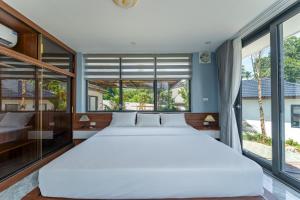 Postel nebo postele na pokoji v ubytování Quang Minh villa + 68 fotografií