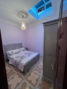 Ένα ή περισσότερα κρεβάτια σε δωμάτιο στο Apartamento con 3 habitaciones ROOMS