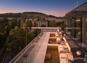 a building with a train on top of it at Hotel Prior & Energy Spa in Zlín