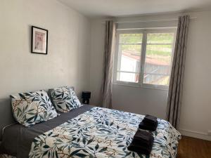 Ένα ή περισσότερα κρεβάτια σε δωμάτιο στο Cosy 2 bedroom apartment