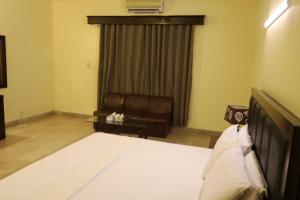 Ένα ή περισσότερα κρεβάτια σε δωμάτιο στο Mashwani Guest House