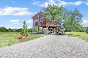 a house on the side of a gravel road at Lover's Lair at Bent Tree Ranch in Lampasas