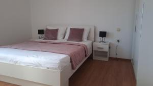 Postel nebo postele na pokoji v ubytování Gabrijela