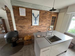 Η κουζίνα ή μικρή κουζίνα στο Appartement Cosy & Elégant