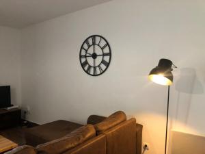 Posezení v ubytování Bel appartement cosy kennedy proche centre ville