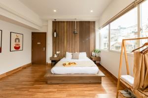 Postel nebo postele na pokoji v ubytování The Morris Boutique Hotel 2 - O'TEL