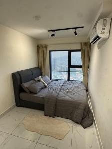 Katil atau katil-katil dalam bilik di The AJ's Suites - Arte Cheras