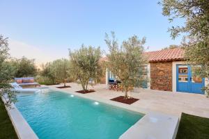 a swimming pool in the backyard of a house at Quinta do Cedro Azul, Douro Valley in Fontelo