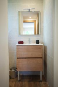 a bathroom with a sink and a mirror at TREE LODGY - LINAE - Nouveau espace bien être disponible in Ray-sur-Saône
