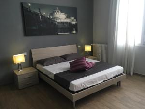 Gulta vai gultas numurā naktsmītnē Caracalla Room Rental