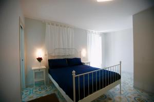 
Cama o camas de una habitación en B&B Divina Salerno
