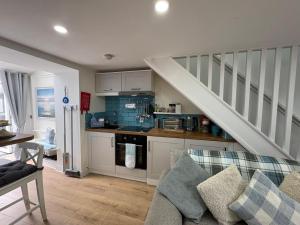 Η κουζίνα ή μικρή κουζίνα στο Pauls Place - Festive Cottage with Hot Tub +30 φωτογραφίες