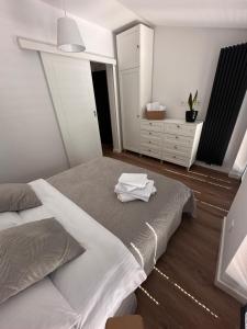 Katil atau katil-katil dalam bilik di Apartament Stara Środa