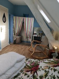 En eller flere senge i et værelse på Maison de charme en station thermale